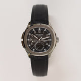 Patek Philippe Aquanaut Travel Time 5164A-001 Black Dial Oct 2012 - View 1