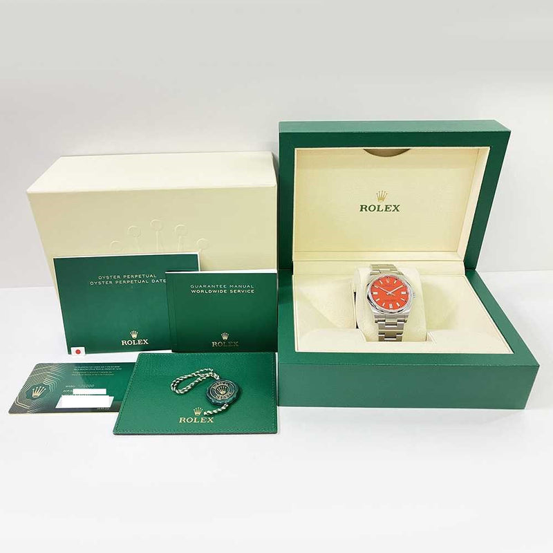 Rolex Oyster Perpetual 126000 Coral Red Dial