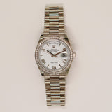 Rolex Day-Date 36mm White Gold 128349RBR White Roman Dial Apr 2025 - View 1