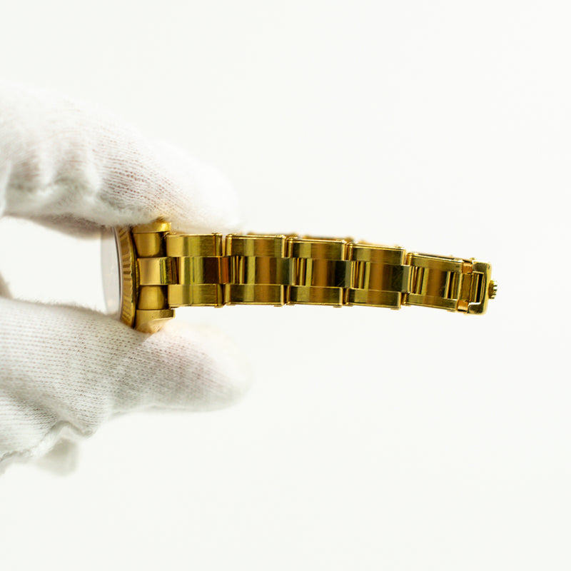 Rolex Oyster Perpetual 67198 Champagne Dial Jul 1999